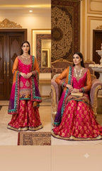A woman modeling a traditional South Asian Lehnga, shirt and tie-dye dupatta outfit. The outfit features a bright pink with orange and purple contrast  shirt and dupatta with intricate gold embroidery. Flared banarsi Lehnga  with gold motifs, and a purple dupatta with blue and green borders.